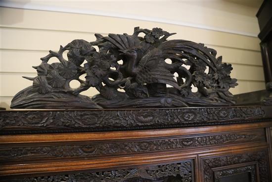 A Japanese Meiji period carved wood and shibayama cabinet, W.3ft 10in. D.1ft .5in. H.6ft 2in.